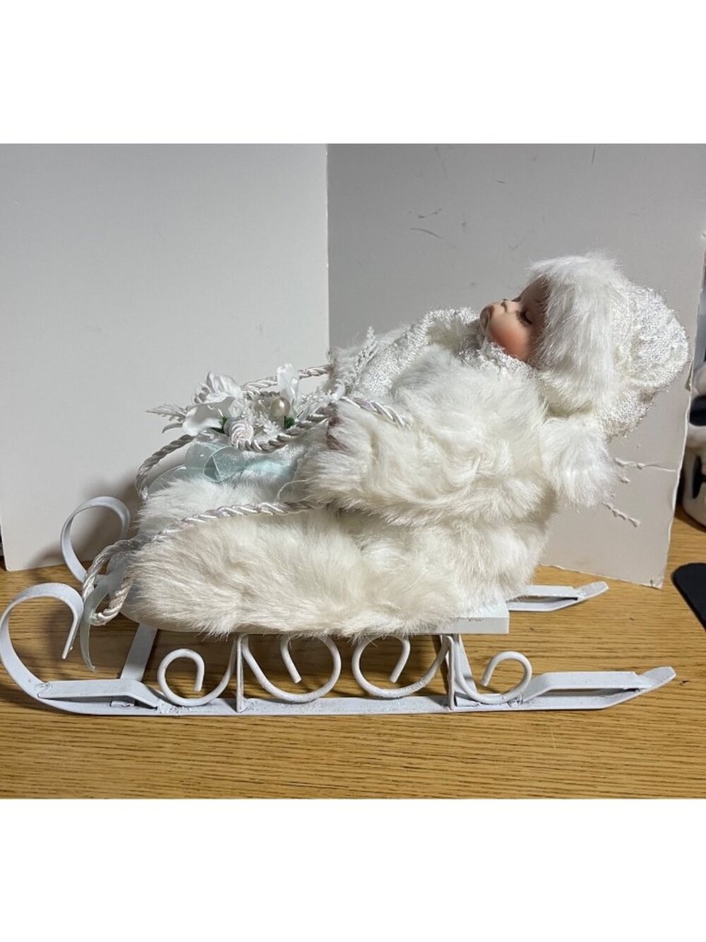Heritage Signature Collection Winter Baby Figurine In White Faux Fur On Sleigh